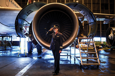 Ana Sousa, 45, TAP Air Portugal pilot for 11 years, poses for a portrait at a TAP hangar in Lisbon.