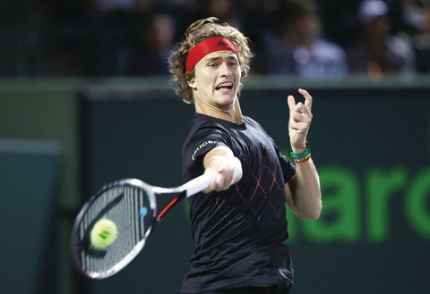 KEY BISCAYNE: Alexander Zverev of Germany plays a forehand against Nick Kyrgios of Australia in their fourth round match during the Miami Open on Tuesday. – AFP