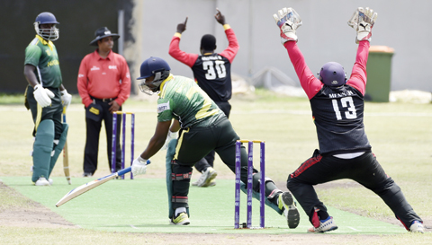 LAGOS: Ghanaian players appeal for a decision against a Nigerian batsman from the umpire during an International Cricket Council (ICC) World Twenty20 African ‘A’ qualification match between Nigeria and Ghana in Lagos on Tuesday. The inaugural ICC World Twenty20 African qualifier has began in Lagos with four countries, Nigeria, Ghana, Gambia and Sierra Leone participating. — AFP