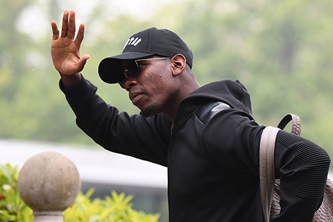 YVELINES: France’s national football team’s midfielder Paul Pogba arrives at the team’s training camp ahead of the 2018 World Cup yesterday. – AFP 
