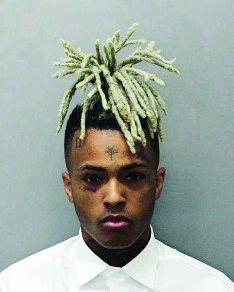 MIAMI: In this 2017 arrest photo made available by the Miami Dade Dept of Corrections shows Jahseh Onfroy, also known as the rapper XXXTentacion, under arrest.-AP 