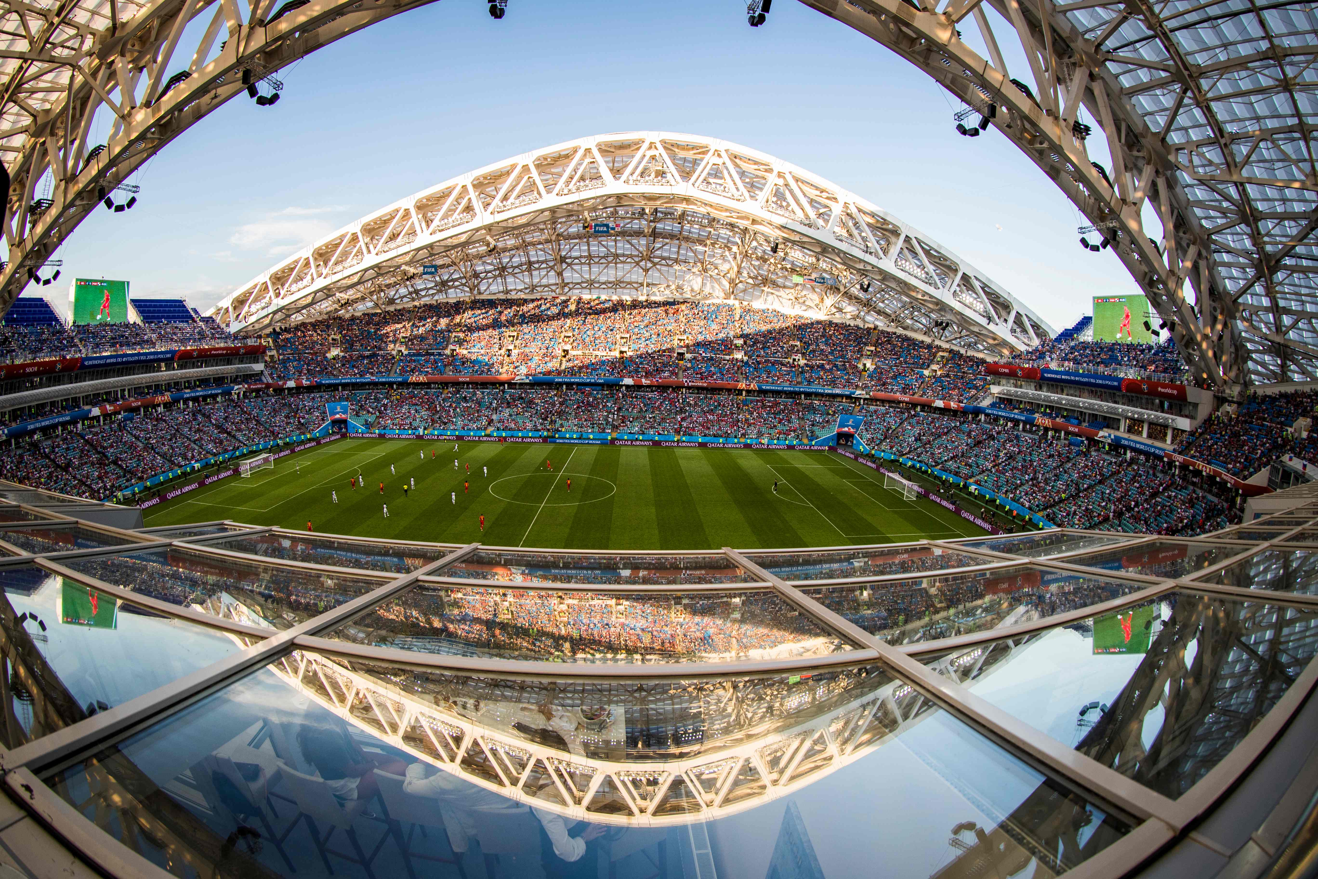 The opposite tribune is reflected in a glass roof during the Russia 2018 World Cup Group G football match between Belgium and Panama at the Fisht Stadium in Sochi on June 18, 2018.nA sensational volley by Dries Mertens and a Romelu Lukaku double fired classy Belgium to a 3-0 win against World Cup debutants Panama in Sochi. / AFP PHOTO / Odd ANDERSEN / RESTRICTED TO EDITORIAL USE - NO MOBILE PUSH ALERTS/DOWNLOADS