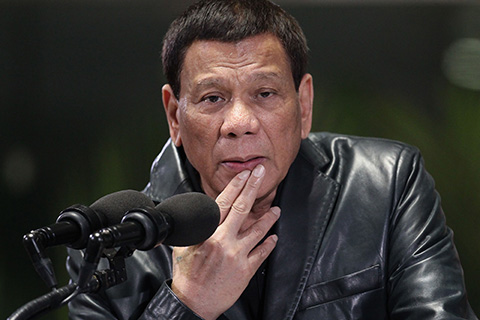 MANILA: Philippine President Rodrigo Duterte gestures as he gives his departure speech at the Manila International airport. – AFP 