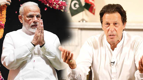 NEW DELHI/ISLAMABAD: In this combo picture, Indian Prime Minister Narendra Modi gestures to greet attendees during Bharatiya Janata Party (BJP) Parliamentary committee meeting at Parliament and in a handout photograph released by political party Pakistan Tehreek-e-Insaf (PTI) on July 26, 2018, Pakistan’s cricketer-turned politician Imran Khan, and head of the Pakistan Tehreek-e-Insaf (Movement for Justice) party, addresses the nation at his residence in Islamabad a day after general election. — AFP photos