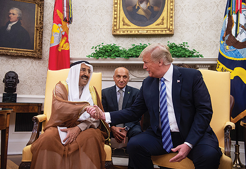 WASHINGTON: His Highness the Amir Sheikh Sabah Al-Ahmad Al-Jaber Al-Sabah shakes hands with US President Donald Trump in the Oval Office at the White House in Washington, DC, on September 5, 2018. — AFP and Amiri Diwan photos