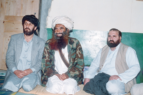 MIRANSHAH: This picture taken on April 2, 1991 shows Afghan commander Jalaluddin Haqqani (C) with two top guerilla commanders Amin Wardak and Abdul Haq at his Pakistani base. —AFP