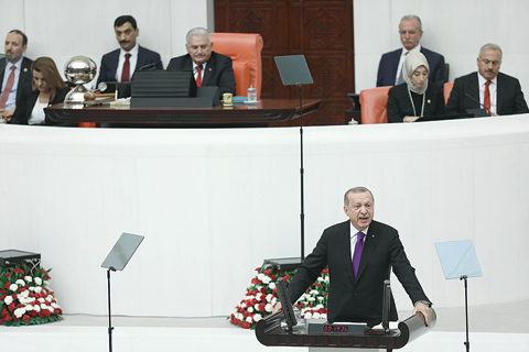 ANKARA: The President of Turkey, Recep Tayyip Erdogan, addresses Turkish members of the parliament during the opening of the second legislative year of the 27th Term of Grand National Assembly of Turkey (TBMM) in Ankara. —AFP