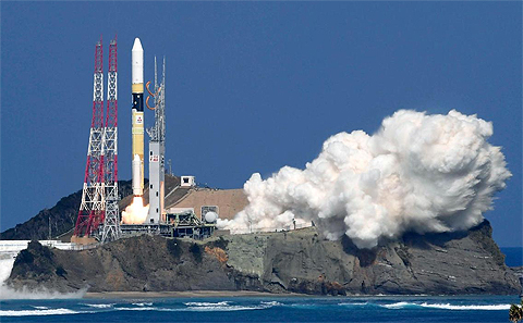 Japan's rocket H-IIA, carrying KhalifaSat, is launched, from Tanegashima, southern Japan, on Monday. Nozomi Endo / Kyodo News via AP