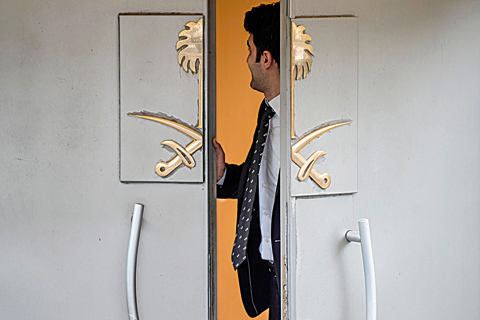    ISTANBUL: An official stands at the door of Saudi Arabia's consulate in Istanbul during ongoing investigations into the killing of Saudi journalist Jamal Khashoggi. - AFP 
