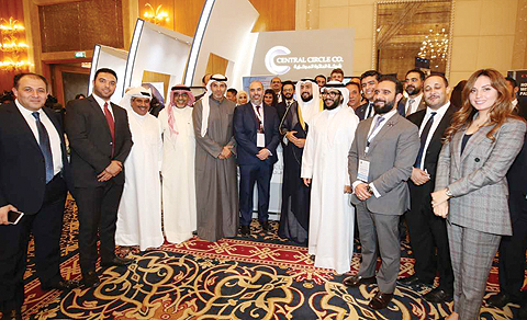 Sheikh Basel and Dr Ziad Al-Alyan pose for a group photo with Central Circle Co staff. 