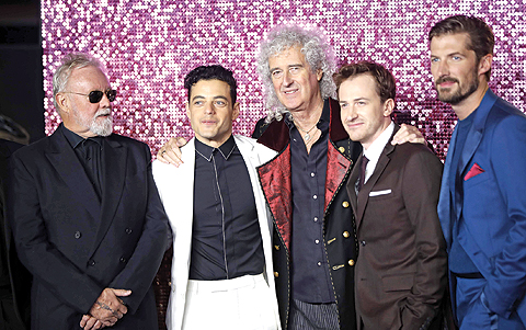 In this file photo (L-R) British musician, and drummer of the rock band Queen, Roger Taylor, US actor Rami Malek, British musician, and lead guitarist of the rock band Queen, Brian May, US actor Joe Mazzello and British actor Gwilym Lee pose on the red carpet as they arrive for the world premiere of the film ‘Bohemian Rhapsody’ at Wembley Arena in north London.—AFP