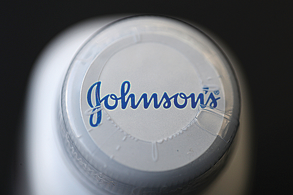 In this photo illustration, a container of Johnson’s baby powder made by Johnson and Johnson sits on a table in San Francisco, California. —AFP