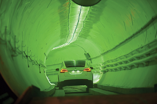 HAWTHORNE, United States: A modified Tesla Model X drives into the tunnel entrance before an unveiling event for the Boring Co. Hawthorne test tunnel.