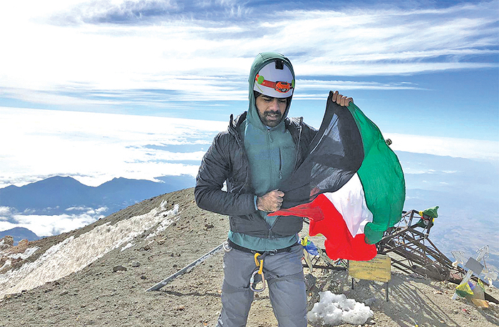 Kuwaiti mountaineer Youssef Al-Rifaie raises Kuwait’s flag at the Pico de Orizaba mountain in Mexico