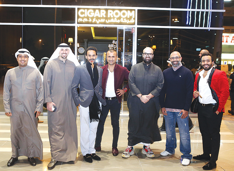 KUWAIT: The seven partners of Cigar Room pose for a photo. — Photo by Yasser Al-Zayyat