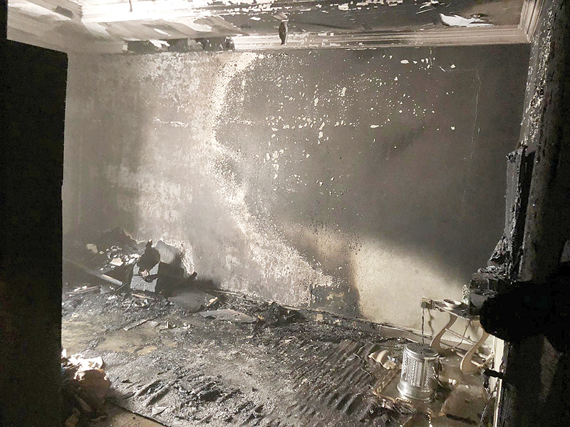 KUWAIT: Extensive damage seen inside a Salwa building where a fire was reported