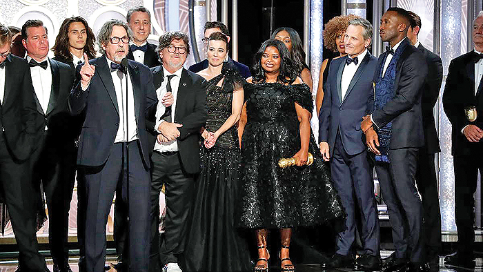 Peter Farrelly, foreground, accepting the award for best comedy film for ‘Green Book’ during the 76th Annual Golden Globe Awards. — AP