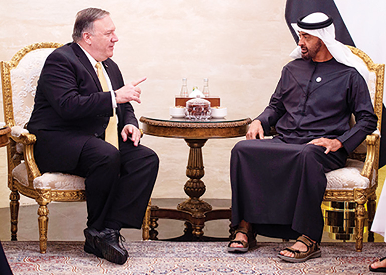 Abu Dhabi's Crown Prince Mohammed bin Zayed Al-Nahyan (R) speaks with US Secretary of State Mike Pompeo during a meeting at Al-Shati Palace in the UAE capital Abu Dhabi. (Photo by ANDREW CABALLERO-REYNOLDS / POOL / AFP)