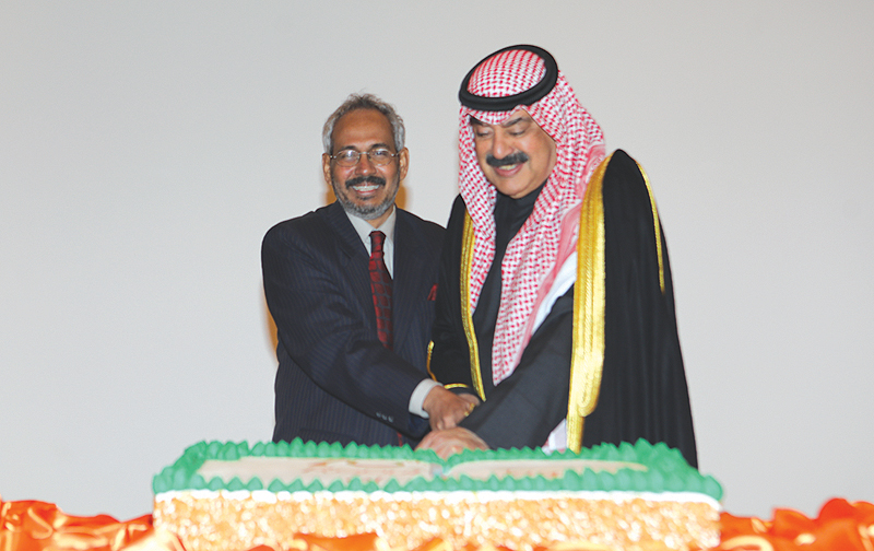 KUWAIT: Deputy Foreign Minister Khaled Al-Jarallah (right) and Ambassador of India to Kuwait Jeeva Sagar cut the cake during the Indian embassy’s celebration of India’s National Day. — Photos by Joseph Shagra