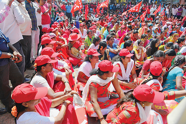 BANGALORE: Members of the Centre of Indian Trade Unions (CITU) gather as they protest during a nationwide strike, in Bangalore yesterday. Unions said that some 200 million workers took part in what they called the biggest show of force since Modi's right-wing government took office in 2014, accusing it of neglecting workers and farmers. -AFP 
