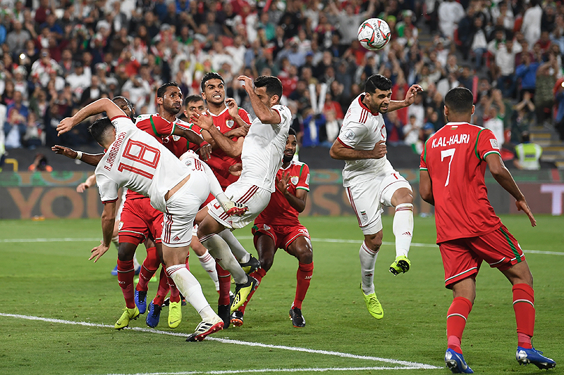 ABU DHABI: Players vie for the header during the 2019 AFC Asian Cup Round of 16 football match between Iran and Oman at the Mohammed Bin Zayed Stadium in Abu Dhabi on Sunday. – AFP