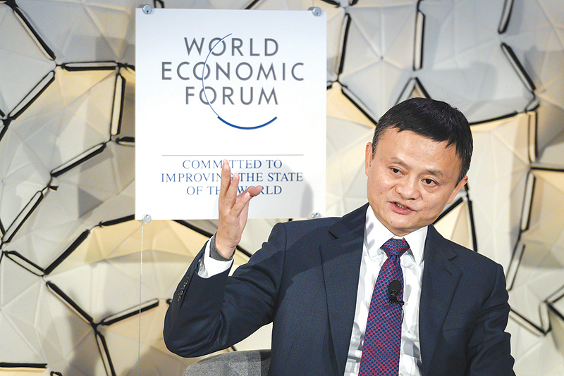 DAVOS: Alibaba Group co-founder and executive chairman Jack Ma gestures during a panel session at the World Economic Forum (WEF) annual meeting yesterday in Davos, eastern Switzerland. — AFP