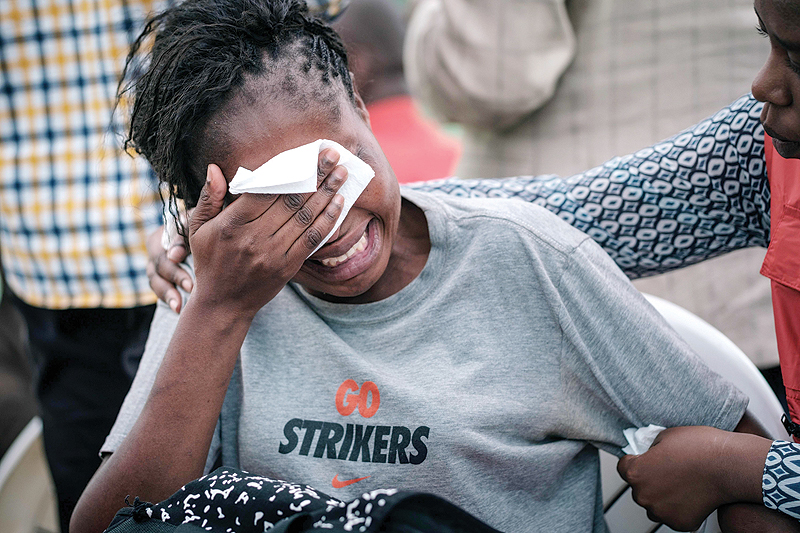 NAIROBI: A woman reacts at the Chiromo mortuary, where the bodies of the victims of an Islamist attack are kept two days prior at the DusitD2 luxury hotel complex, in Nairobi.—AFP