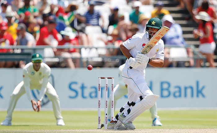 CAPE TOWN: Pakistan batsman Shan Masood plays a shot during the third day of the second Test cricket match between South Africa and Pakistan at Newlands Cricket Stadium in Cape Town yesterday. - AFP