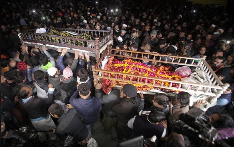 Mourners and relatives carry their family members' bodies, who were killed by police, at their funeral in Lahore, Pakistan January 20, 2019. REUTERS