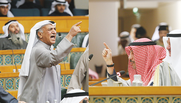 KUWAIT: MP Shuaib Al-Muwaizri (left) and Speaker Marzouq Al-Ghanem argue during a National Assembly session yesterday. — Photos by Yasser Al-Zayyat