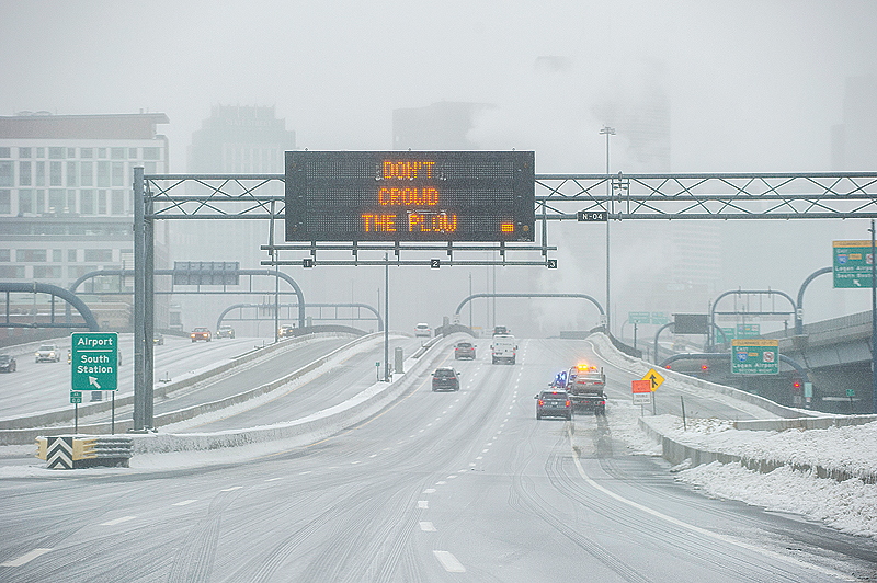 BOSTON: Ice and snow cover Interstate 93 through the city during Winter Storm Harper. —AFP
