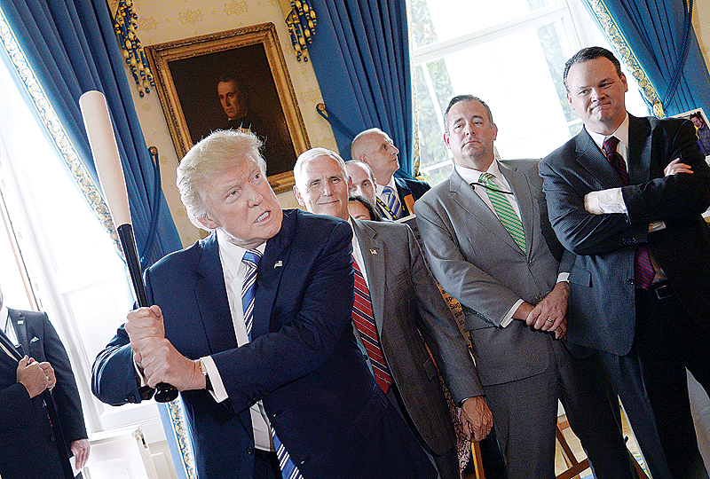 WASHINGTON DC: In this file photo taken on July 16, 2017, US President Donald Trump swings a Marucci baseball bat in the Blue Room during a ‘Made in America’ product showcase event at the White House. —AFP