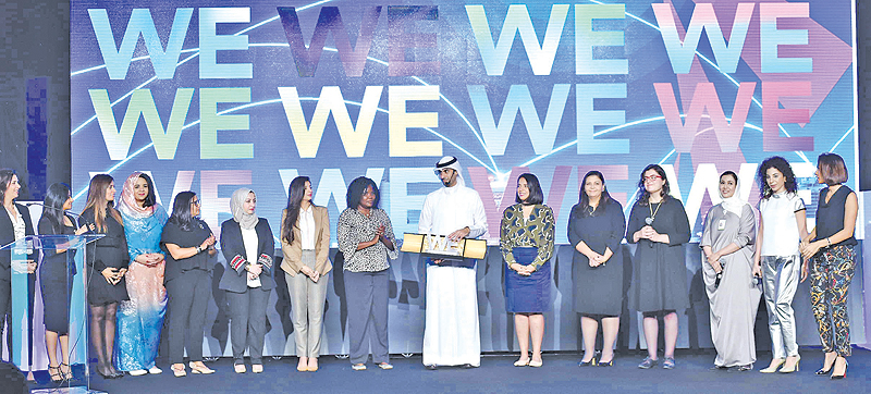 KUWAIT: Bader Al-Kharafi with women champions from Zain operations during a recent conference in Kuwait