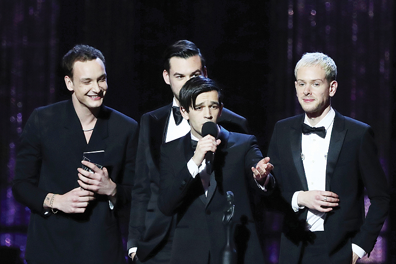 British band 'The 1975', Matthew Healy, Ross MacDonald, George Daniel and Adam Hann speak after collecting their British Album of the Year award during the BRIT Awards 2019 ceremony and live show in London.-AFP photos