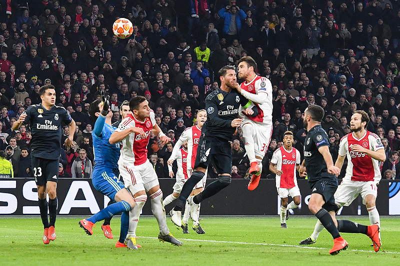 AMSTERDAM: Ajax's Argentine defender Nicolas Tagliafico (C) scores a goal which will be rejected after VAR deliberation during the UEFA Champions league round of 16 first leg football match between Ajax Amsterdam and Real Madrid at the Johan Cruijff ArenA on Wednesday. – AFP