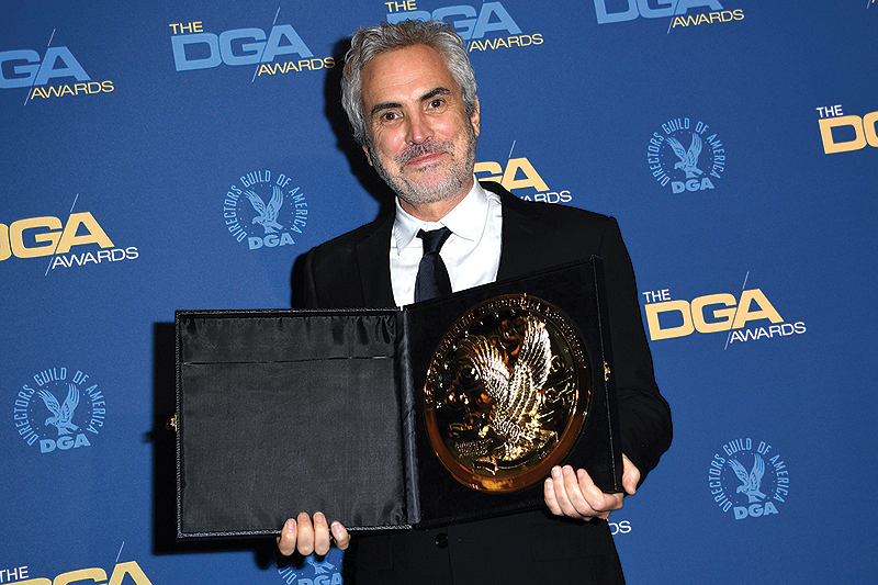 Director Alfonso Cuaron poses with the award for Outstanding Directorial Achievement in Feature Film for “Roma” in the press room during the 71st Annual Directors Guild of America (DGA) Awards at the Ray Dolby Ballroom in Hollywood.