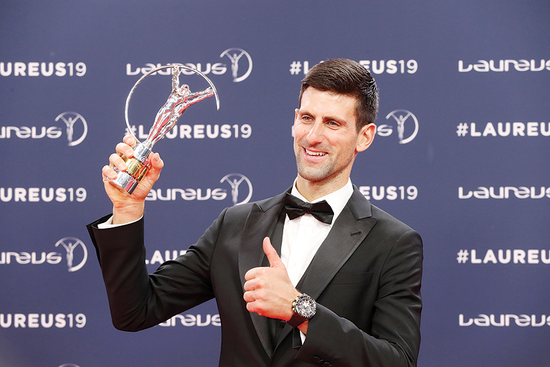 MONACO: Laureus World Sportsman of The Year 2019 winner Serbia’s tennis player Novak Djokovic poses with his award at the 2019 Laureus World Sports Awards ceremony at the Sporting Monte-Carlo complex in Monaco on Monday. — AFP
