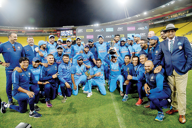 WELLINGTON: India celebrate winning the ODI series following the fifth one-day international (ODI) cricket match between New Zealand and India in Wellington yesterday. - AFP 