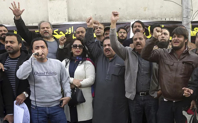 Pakistani journalists chant slogans during demonstration to condemn the arrest of their colleague Rizwan-ur-Rehman Razi, in Lahore, Pakistan, Saturday, Feb. 9, 2019. (AP)