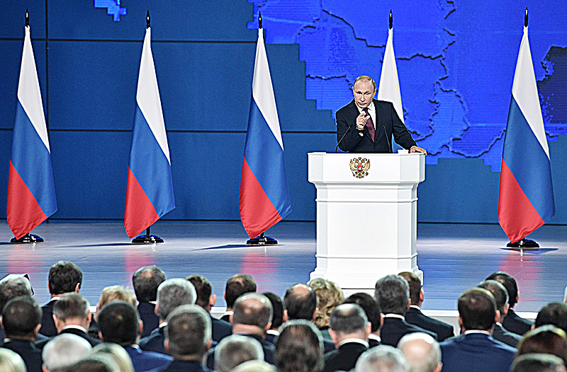 MOSCOW: Russian President Vladimir Putin delivers his annual state of the nation address in Moscow yesterday. —AFP