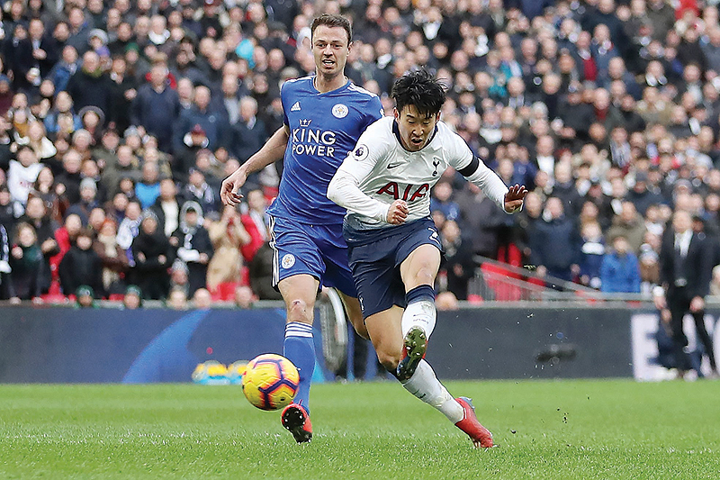 LONDON: Tottenham Hotspur's South Korean striker Son Heung-Min (R) scores his team's third goal during the English Premier League football match between Tottenham Hotspur and Leicester City at Wembley Stadium in London. - AFP