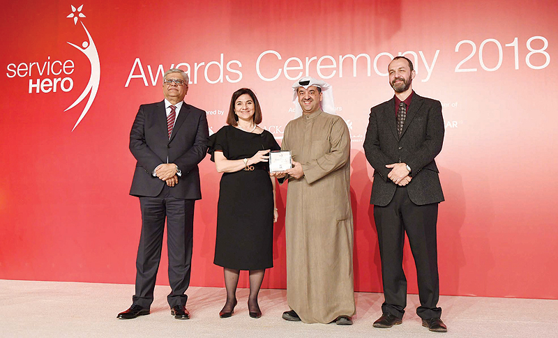 KUWAIT: Waleed Al-Khashti receives Zain’s awards during the ceremony