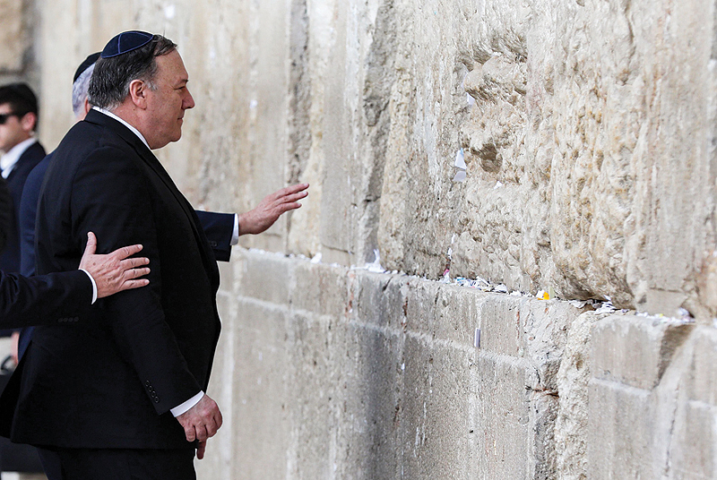 JERUSALEM: US Secretary of State Mike Pompeo prepares to touch the stones of the Western Wall in Jerusalem's Old City yesterday, during the second day of his visit as part of his five-day regional tour of the Middle East. - AFP  