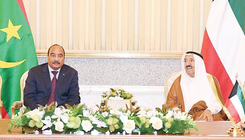 KUWAIT: His Highness the Amir Sheikh Sabah Al-Ahmad Al-Jaber Al-Sabah and Mauritania’s President Mohamed Ould Abd Aziz attend a ceremony to sign a number of agreements between Kuwait and Mauritania yesterday. — Amiri Diwan photo