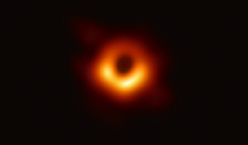 A handout photo provided by the European Southern Observatory yesterday shows the first photograph of a black hole and its fiery halo. - AFP 