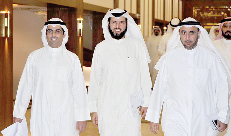 KUWAIT: MPs Riyadh Al-Adasani, Adel Al-Damkhi and Mohammad Al-Dallal filed to grill Information Minister Mohammad Al-Jabri yesterday. — Photo by Fouad Al-Shaikh