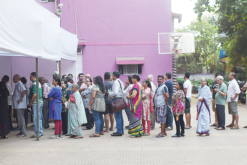 MUMBAI: Indian voters wait for start of voting at a polling booth in Mumbai yesterday. Voting began for the fourth phase of India’s general parliamentary elections. — AFP