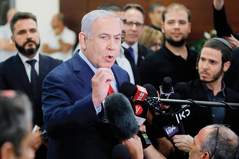 nnnnJERUSALEM: Israeli Prime Minister Benjamin Netanyahu talks to the press following a vote on a bill to dissolve the Knesset  at the Knesset in Jerusalem.-AFPnn