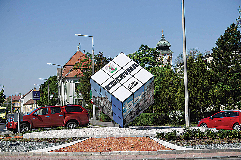 CSORNA, Hungary: A picture taken on April 25, 2019 shows a giant cube displayed at a roundabout in this sleepy Hungarian town. —AFP