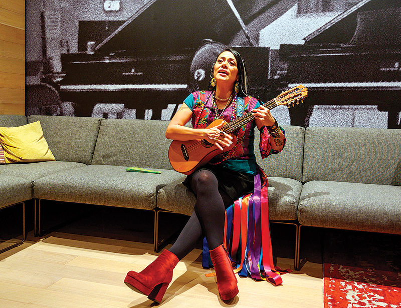 Mexican-American singer-songwriter Lila Downs plays her jarana jarocha during an interview at the Sony building in New York. — AFP